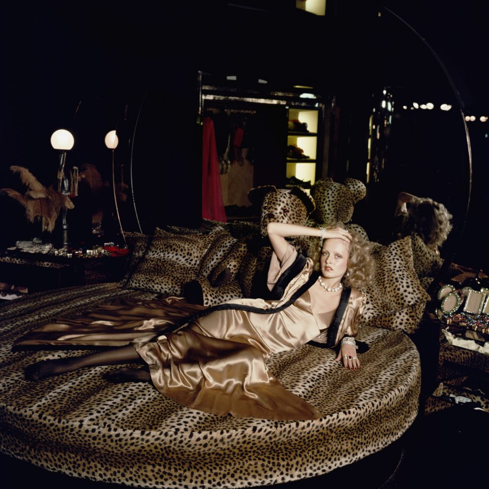 A photograph of Twiggy reclining in Biba, taken in 1973.